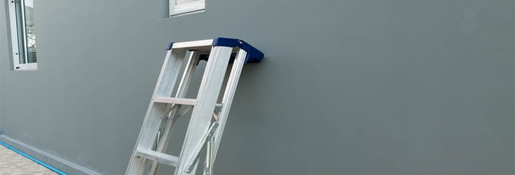 step ladders against a wall