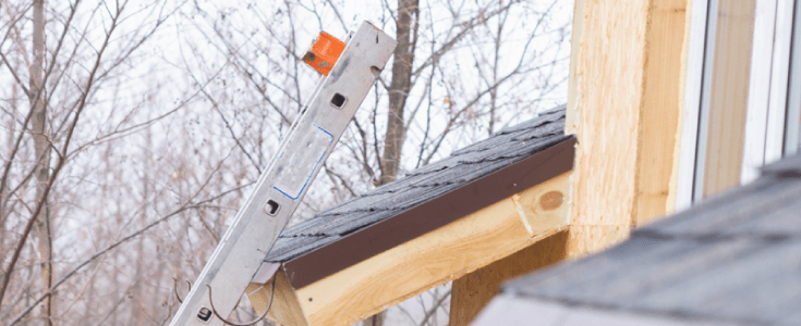 roofing ladder leaning against roof